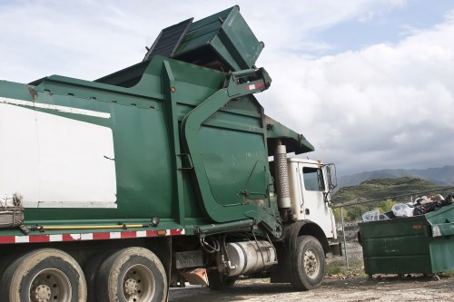 Modern waste collection vehicles in Central London