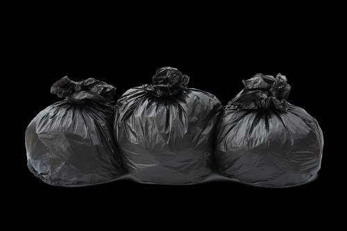 Community members using the Rubbish Collection Monument